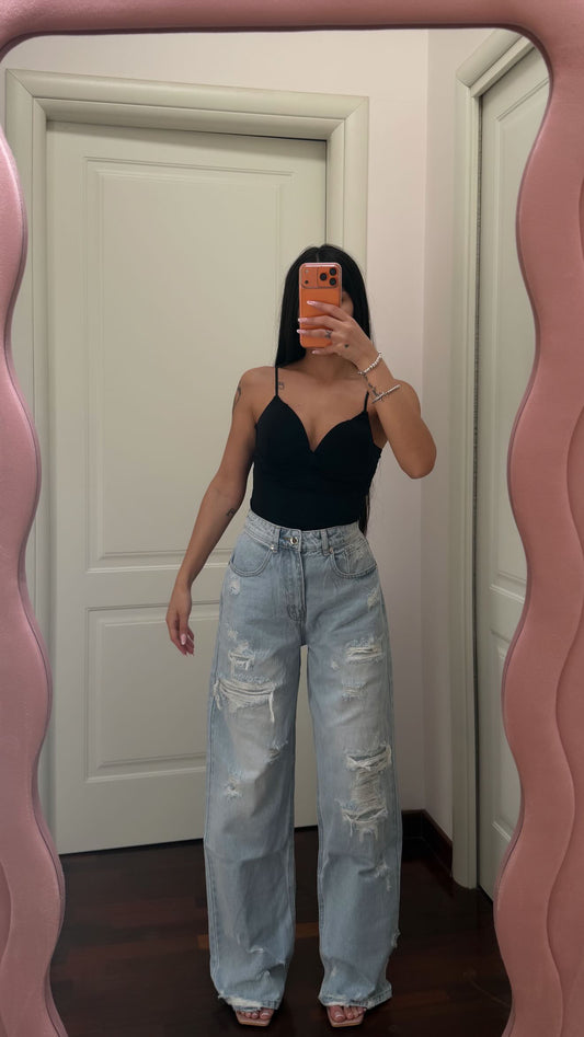 Jeans denim chiaro strappi
